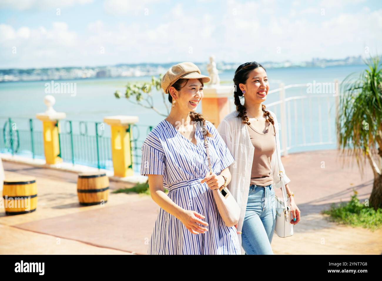 Two women in their 20s enjoying their trip Stock Photo - Alamy