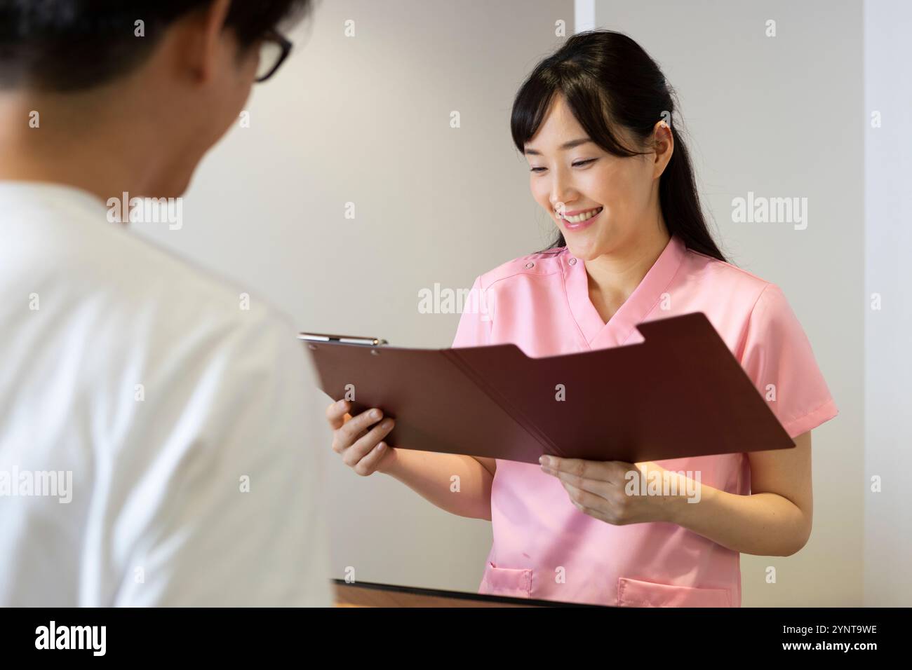 Hospital reception area Stock Photo - Alamy