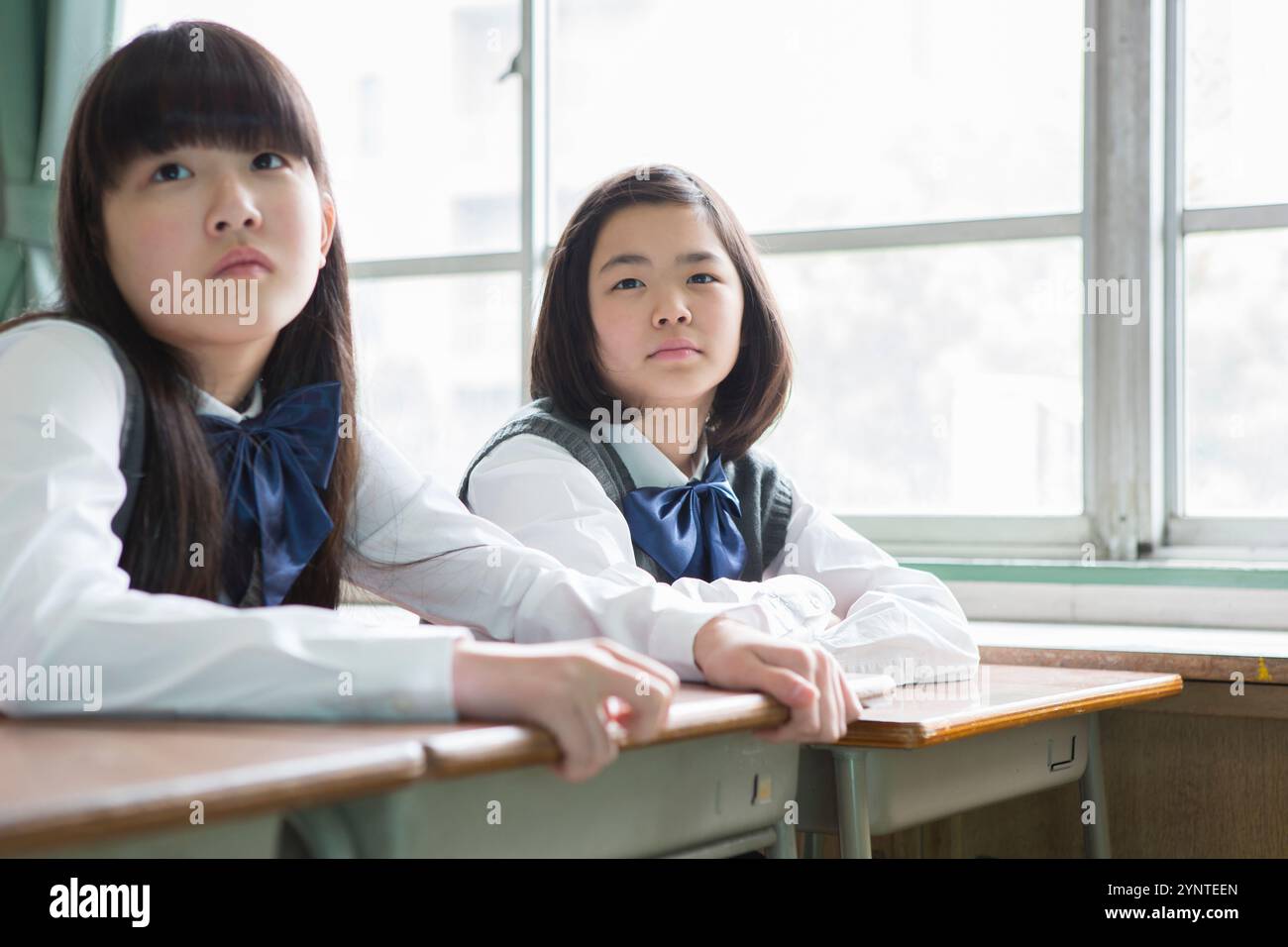 Female student sitting in classroom Stock Photo - Alamy