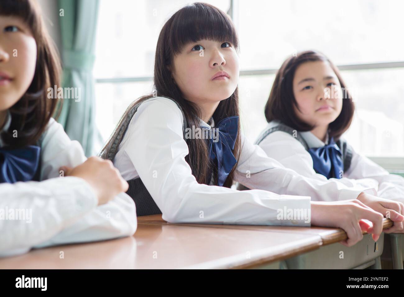 Female student sitting in classroom Stock Photo - Alamy