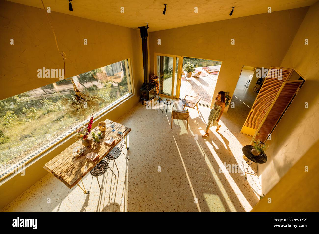 Cozy Living Space with Sunlit Deck Stock Photo - Alamy