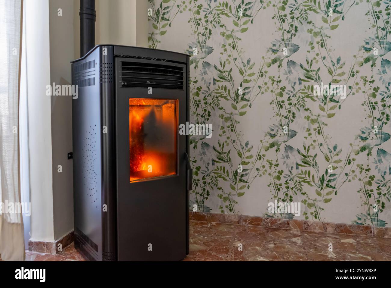 Horizontal image of a fully operational pellet stove, the stove needs ...