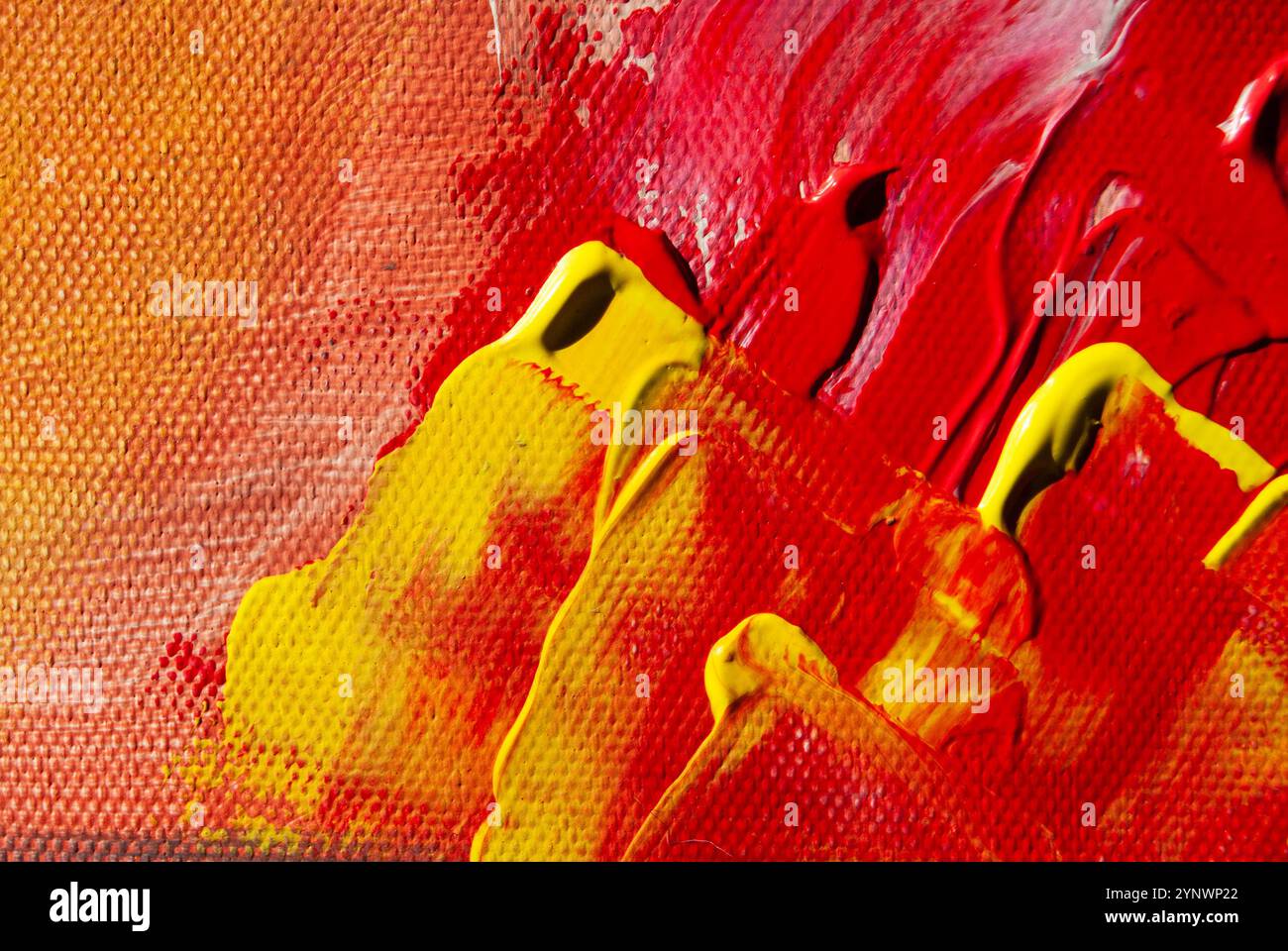 Textured acrylic layers of red, yellow, and white paint, creating an ...