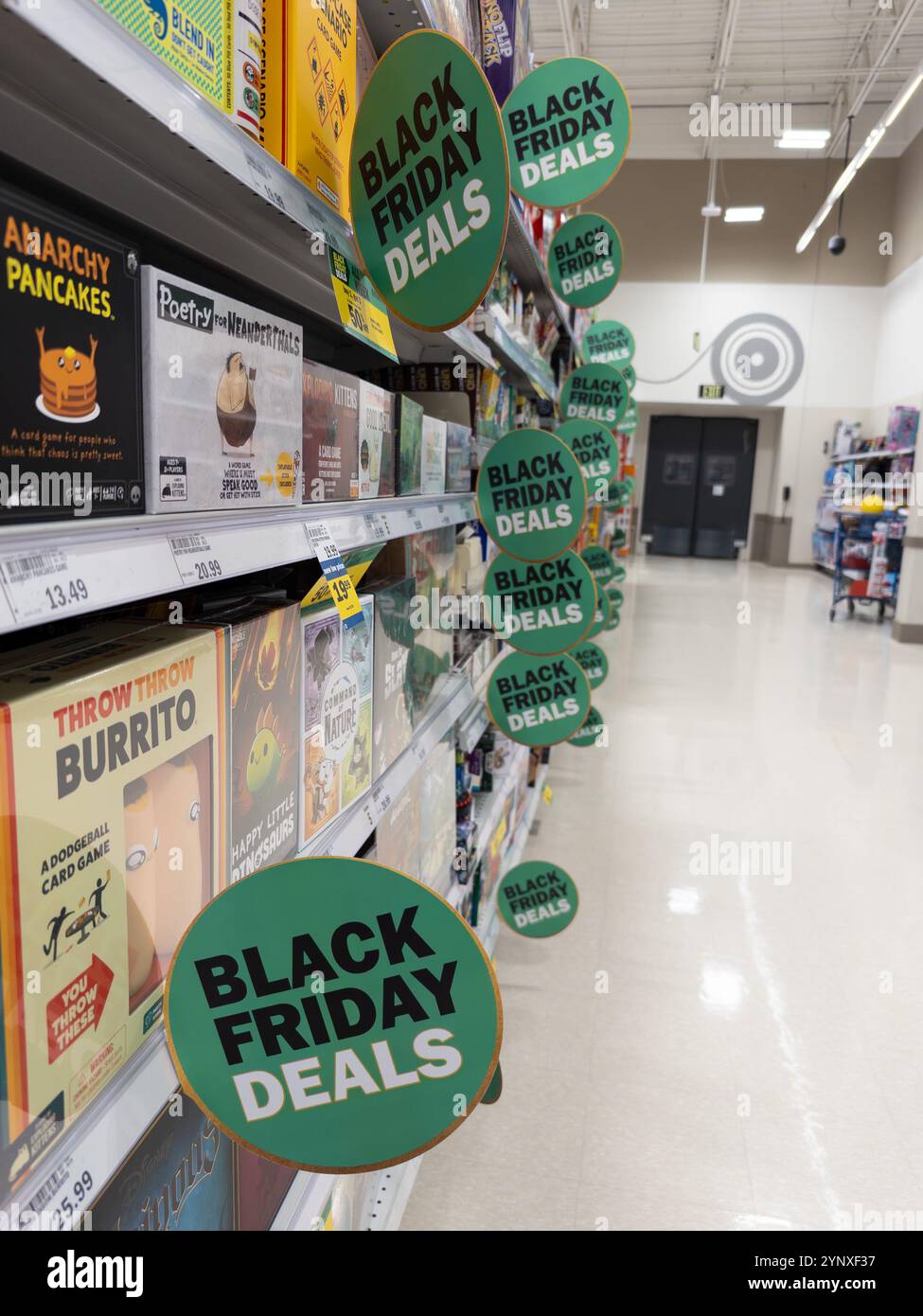 Black Friday Deals signs in the toy and game department of a Meijer store in Burton Michigan USA - Smartphone Captured Stock Image