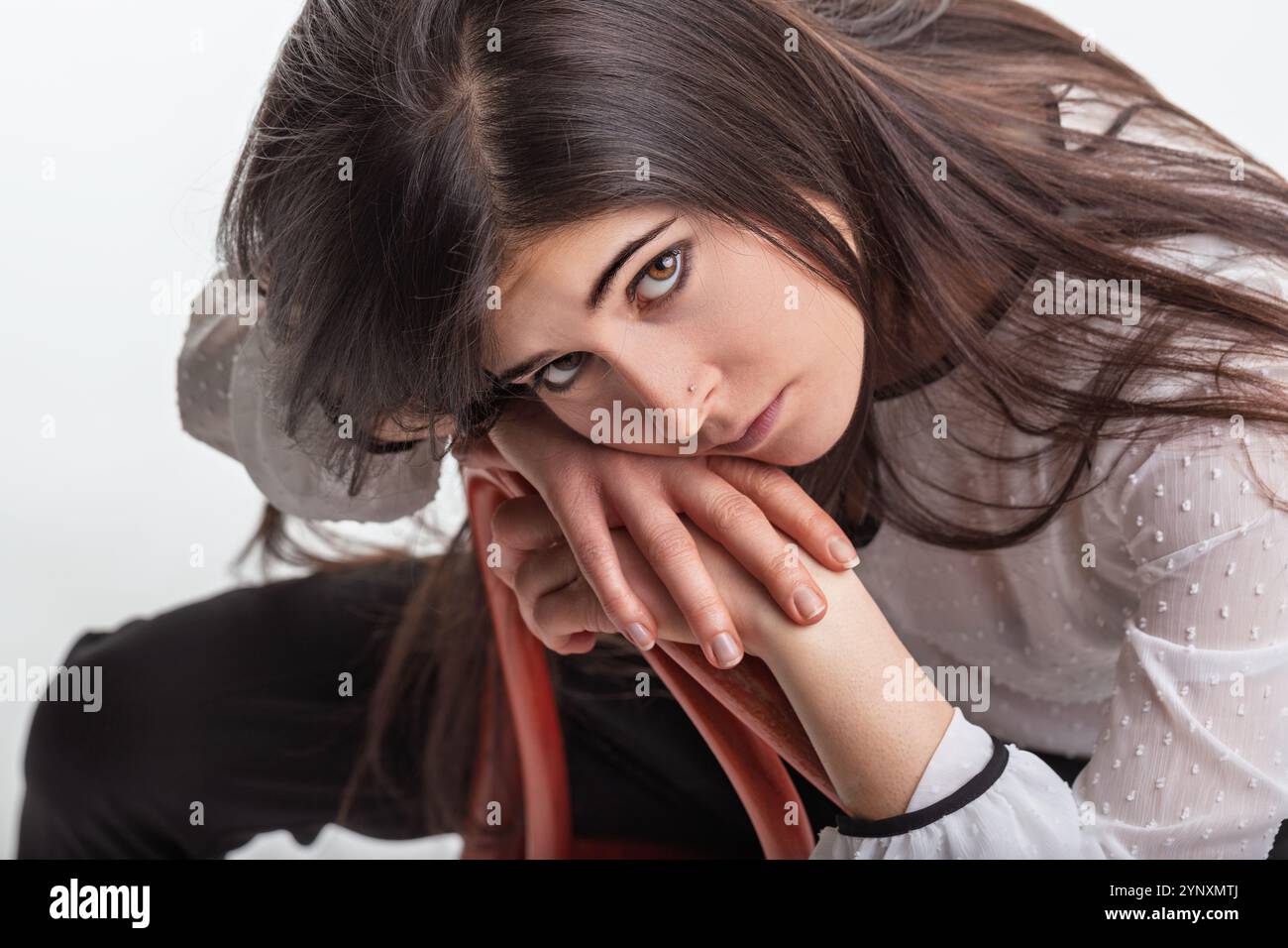 Person leaning back on chair hi-res stock photography and images - Alamy