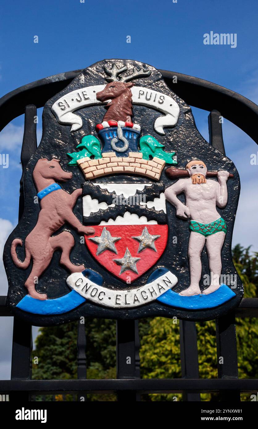 Helensburgh Coat-of-arms depicting - on the shield the saltire of the Colquhouns, three gold stars of the Sutherlands, The savage is from the Sutherla Stock Photo