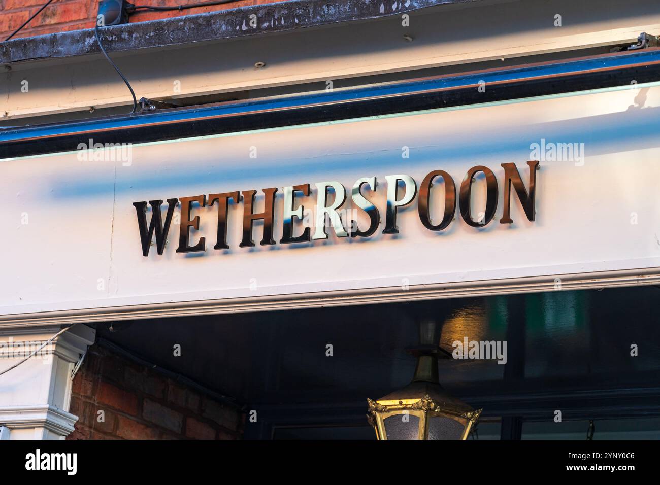 Lichfield, UK – November 26th 2024: Logotype signage of the UK based pub chain, Wetherspoon Stock Photo
