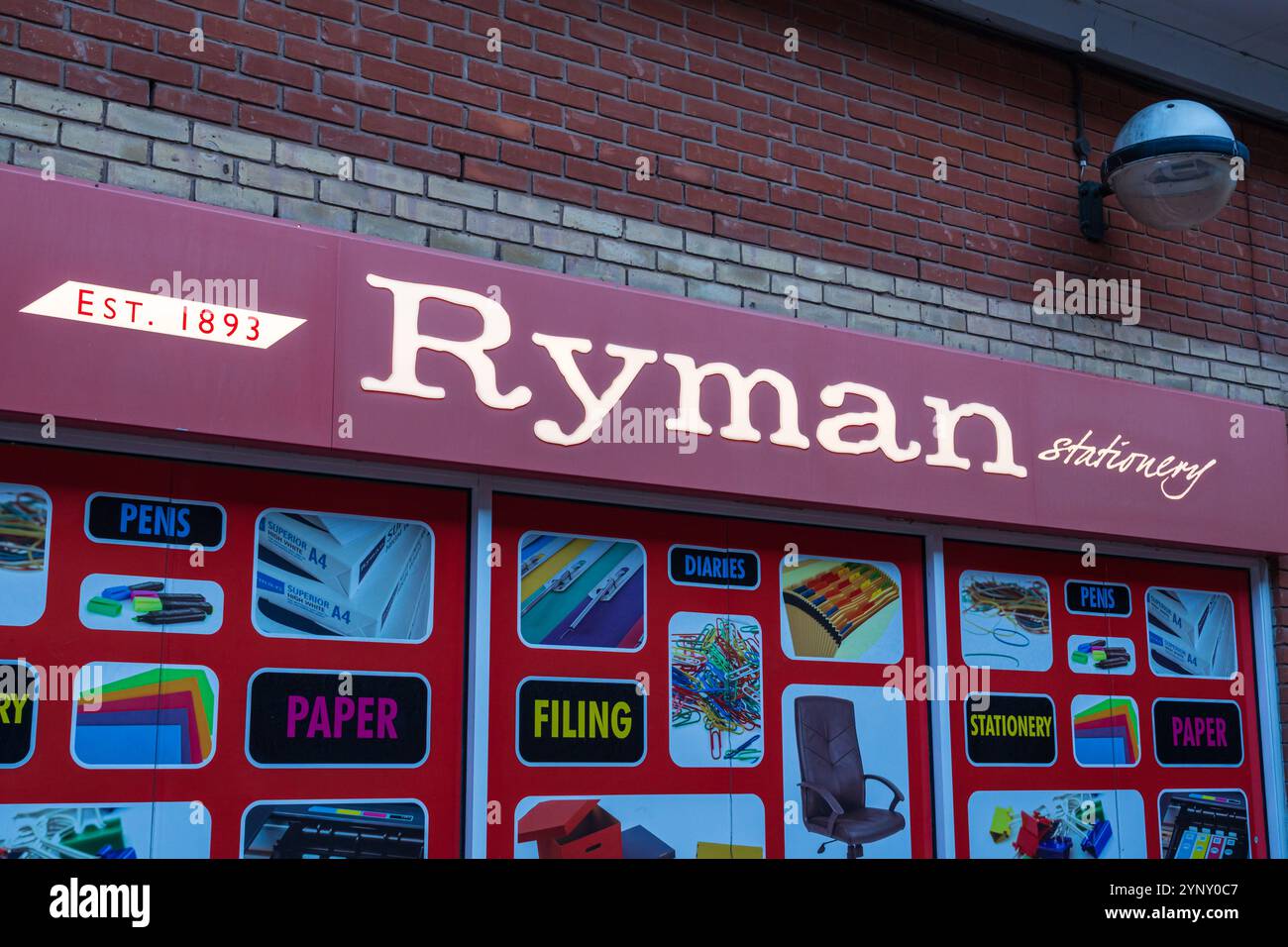 Lichfield, UK – November 26th 2024: External signage of UK based stationery retailers, Ryman Stock Photo
