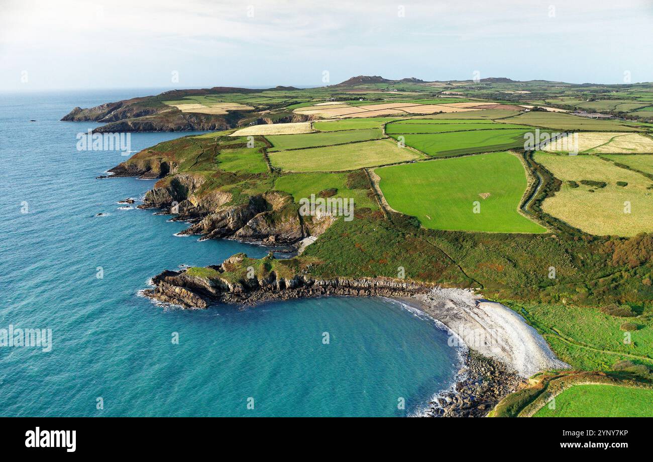 North over Aber Bach beach from the Cable Hut along the Irish Sea coast of Pembrokeshire at Granston, Wales. Pembrokeshire Coast Path. Aerial summer Stock Photo