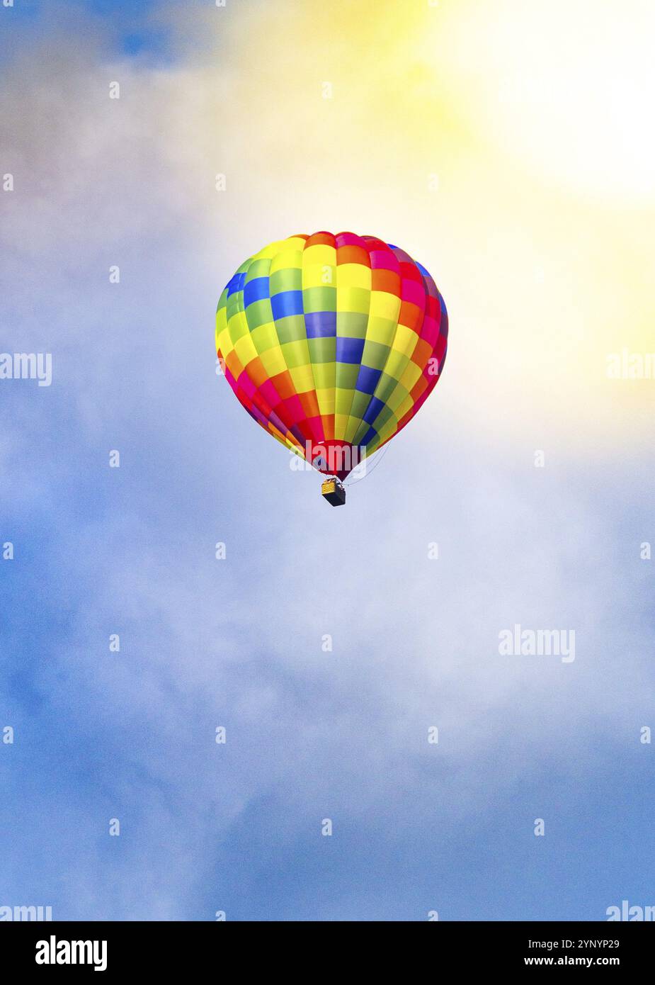 Colorful hot air balloon against a blue sky Stock Photo - Alamy