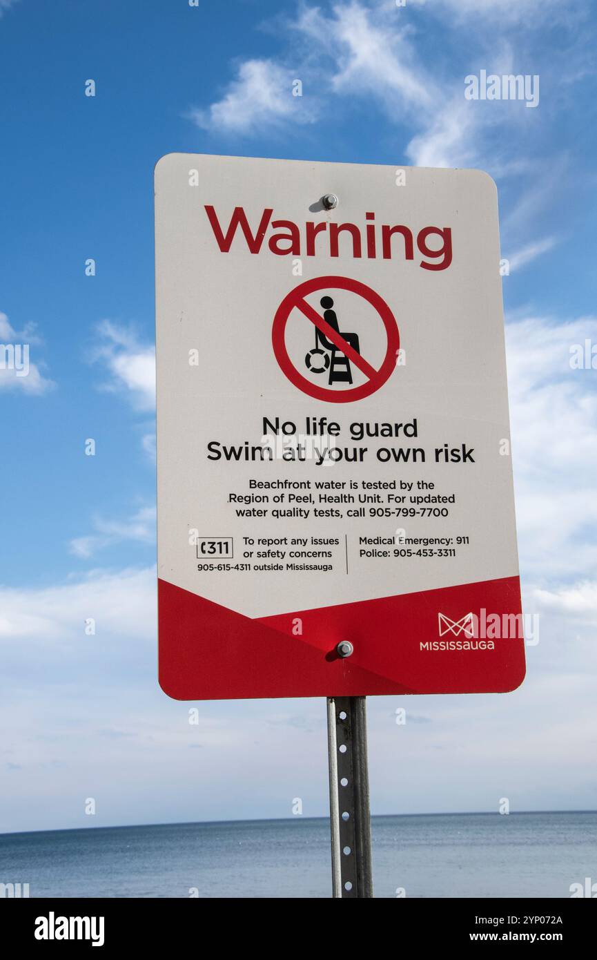 Warning no lifeguard sign on the beach at Jack Darling Memorial Park in ...