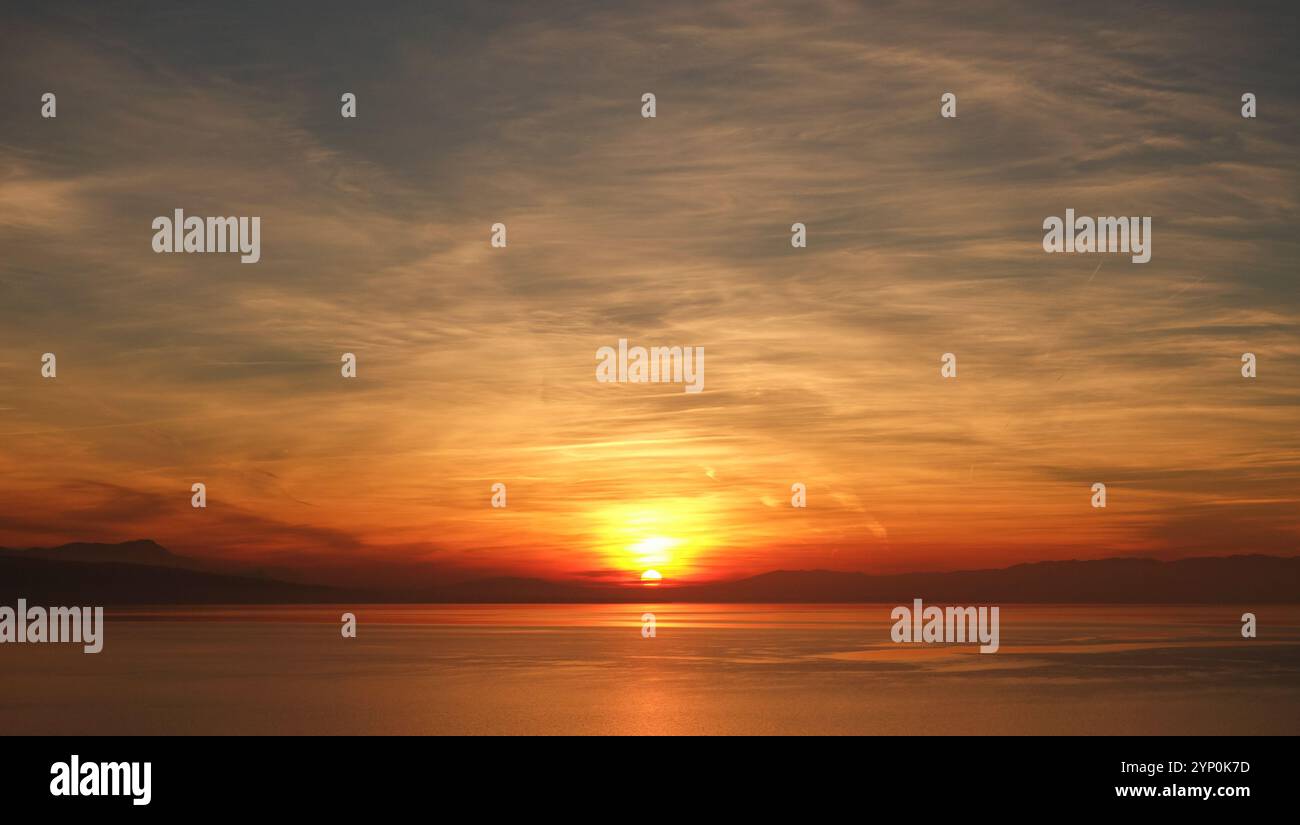 Cloudy summer sunset over hi-res stock photography and images - Alamy