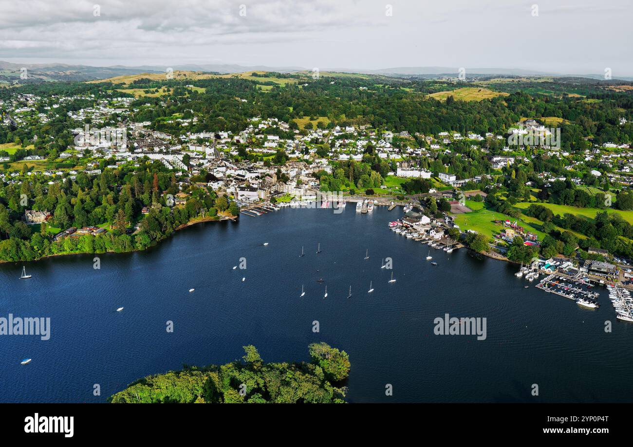 Bowness on Windermere in the Lake District National Park, Cumbria, England. Aerial vista view east from Belle Isle. Summer evening Stock Photo
