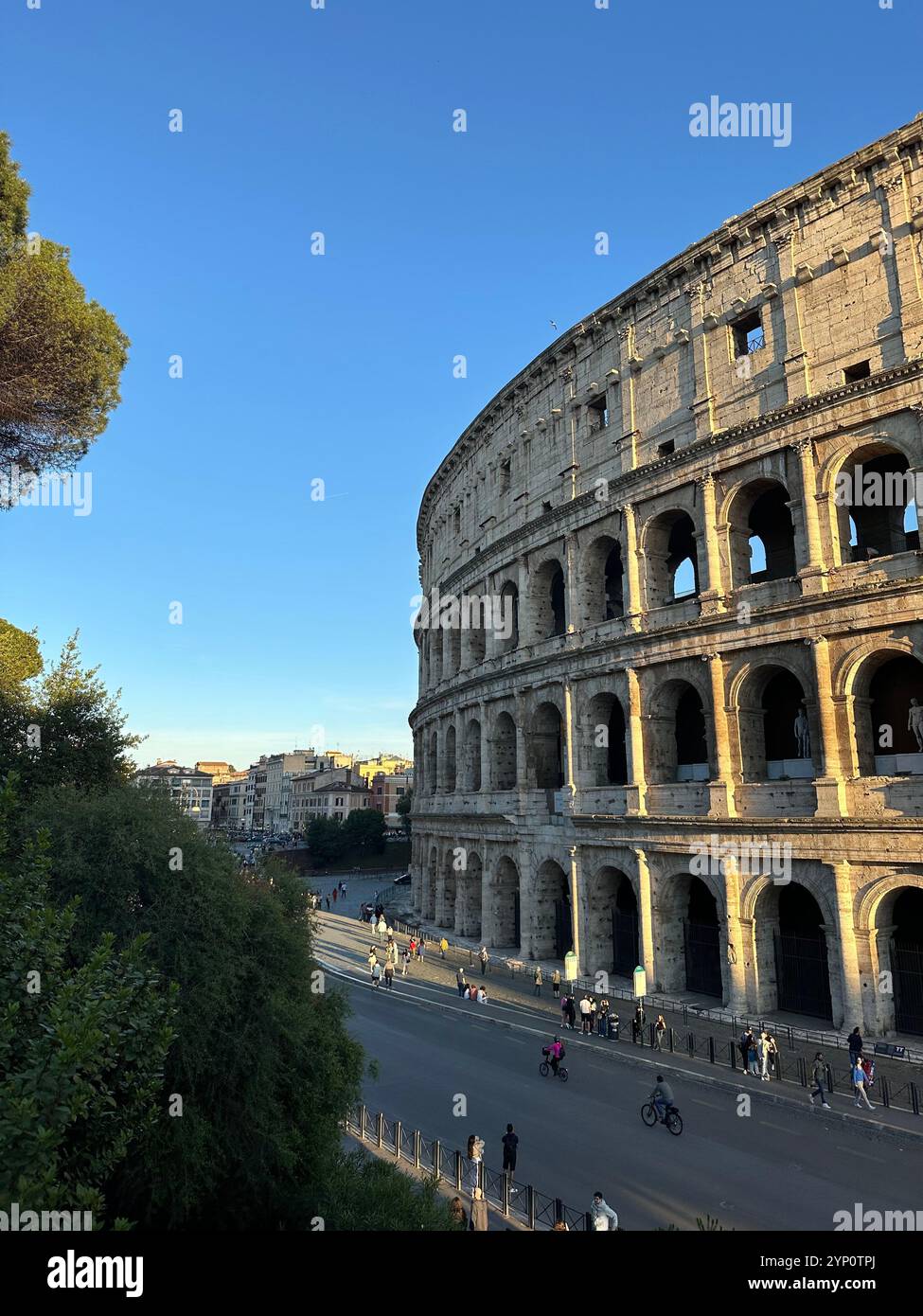 Capture the majestic side profile of the Colosseum, an iconic symbol of ancient Rome, where history and architectural brilliance come alive. - Smartphone Captured Stock Image