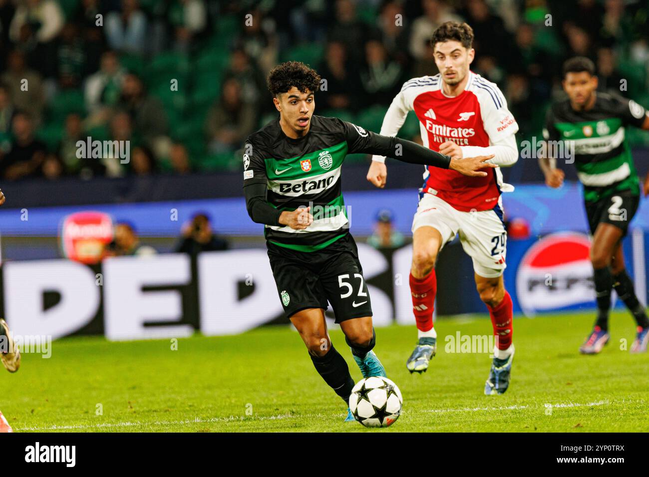 Joao Simoes, Kai Havertz seen during UEFA Champions League game between ...