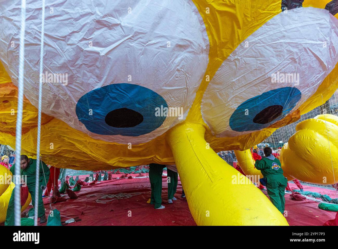 New York, New York, USA. 27th Nov, 2024. Members of the Macy's inflation team work on SpongeBob SquarePants & Gary giant balloon as they prepare ahead of the 98th Macy's Thanksgiving Day Parade on Upper West side in New York on November 27, 2024 (Credit Image: © Lev Radin/ZUMA Press Wire) EDITORIAL USAGE ONLY! Not for Commercial USAGE! Stock Photo