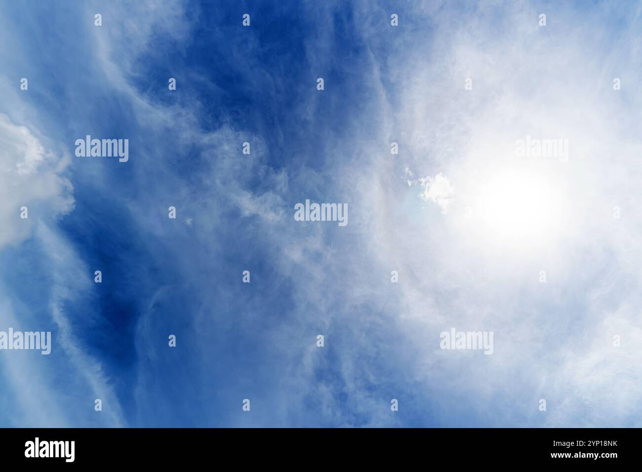 white fluffy clouds in the blue sky Stock Photo