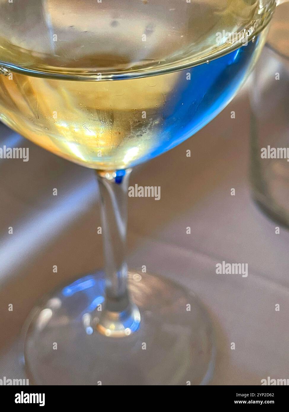 Glass of white wine with reflections. Close view. - Smartphone Captured Stock Image