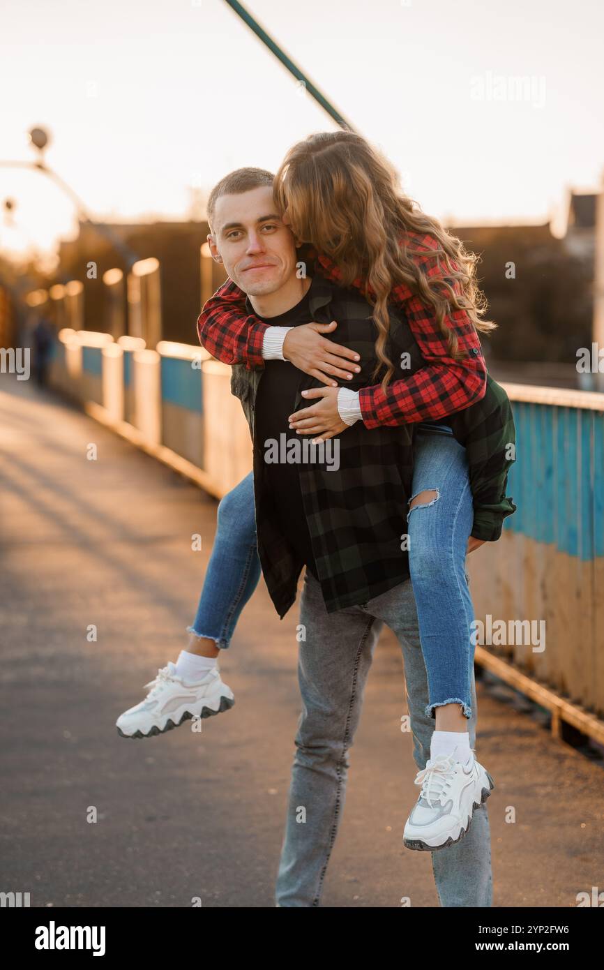 Playful couple sharing joyful hi-res stock photography and images - Alamy