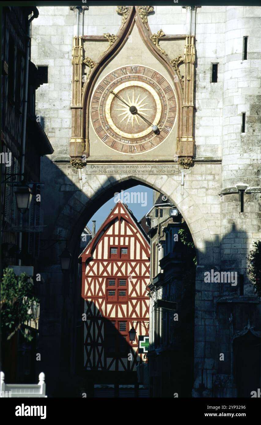 Auxerre, Yonne, Bourgogne-Franche-Comte, France: the clock tower and an half-timbered house Stock Photo