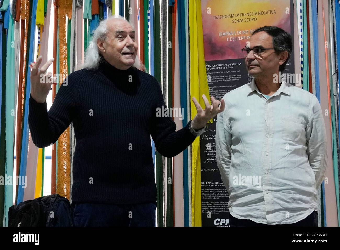 Italian musician Franco Mussida, flanked by Progetto Arca Onus ...