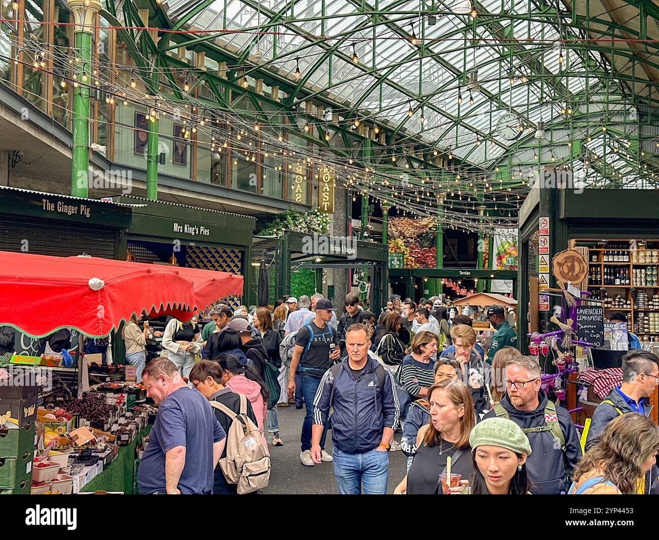 London, England, UK - 3 July 2024: People in Borough Market in central London - Smartphone Captured Stock Image
