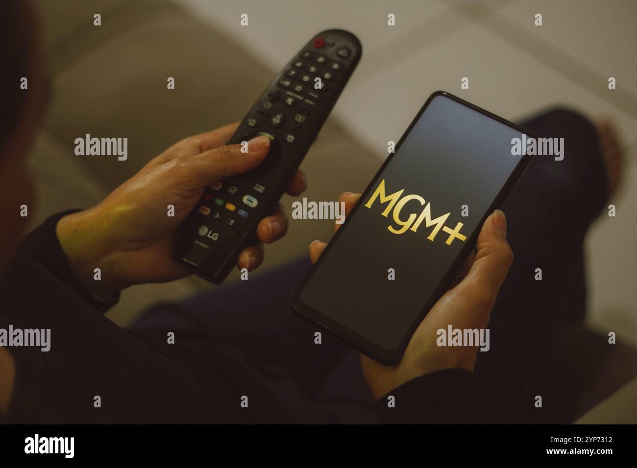 In this photo illustration, the MGM + (MGM Plus) logo seen displayed on a smartphone Stock Photo