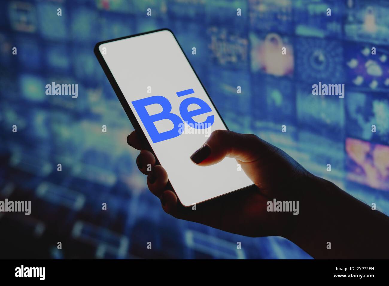In this photo illustration, the Behance logo is displayed on a ...