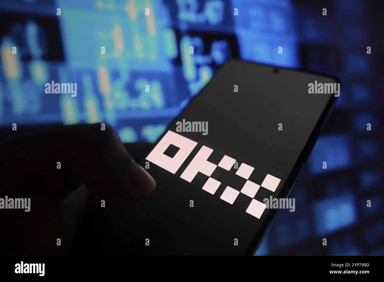 In this photo illustration, the OKX logo is displayed on a smartphone screen Stock Photo