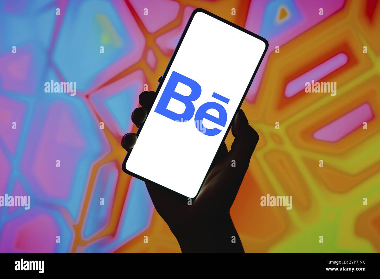 In this photo illustration, the Behance logo is displayed on a ...