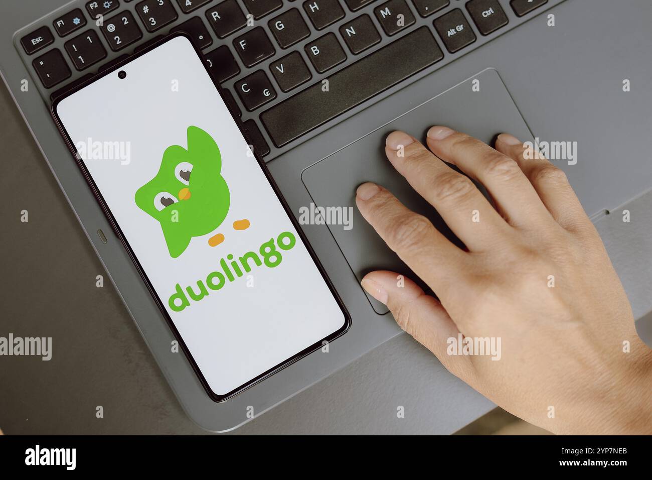 logo is displayed on a smartphone screen Stock Photo