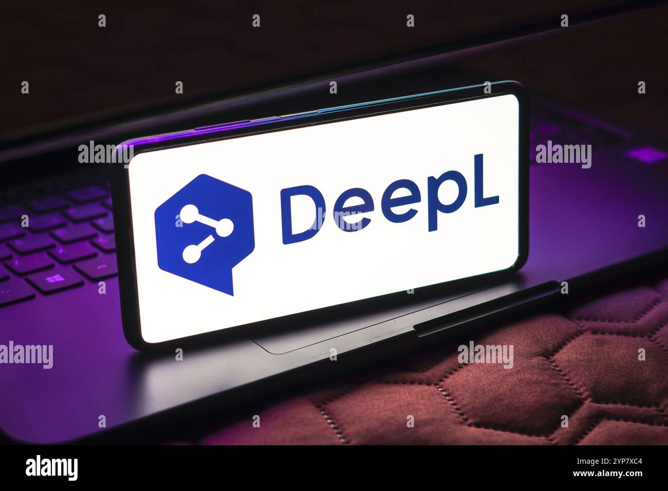 In this photo illustration, the DeepL logo is displayed on a smartphone ...