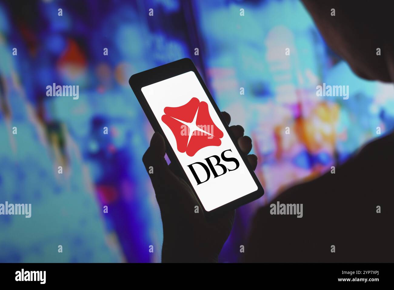 In this photo illustration, the DBS Group Holdings logo is displayed on a smartphone screen Stock Photo