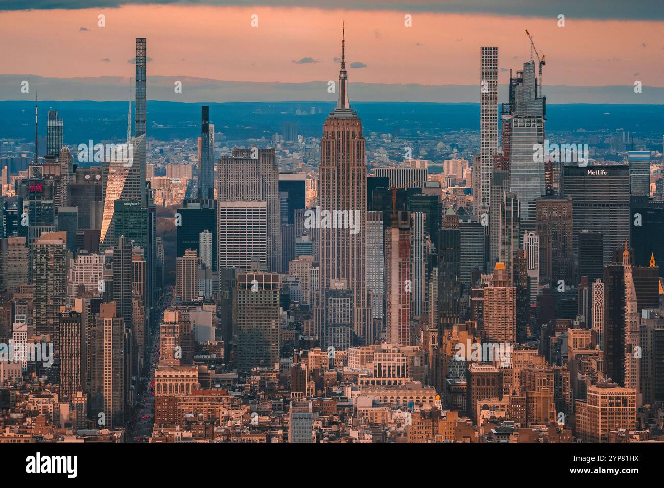 A breathtaking view of the iconic Empire State Building surrounded by ...