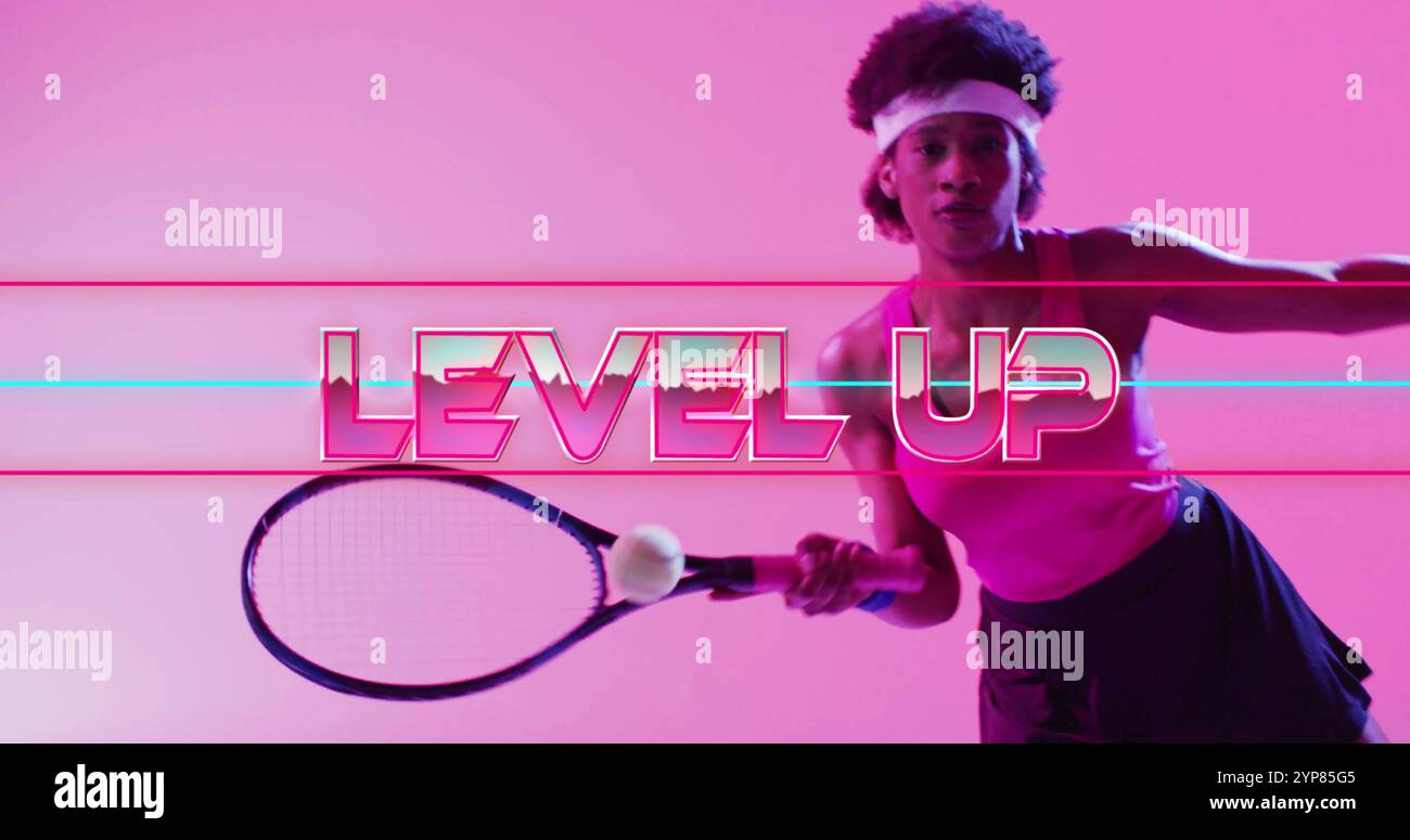 Level up text image over person holding tennis racket on pink ...