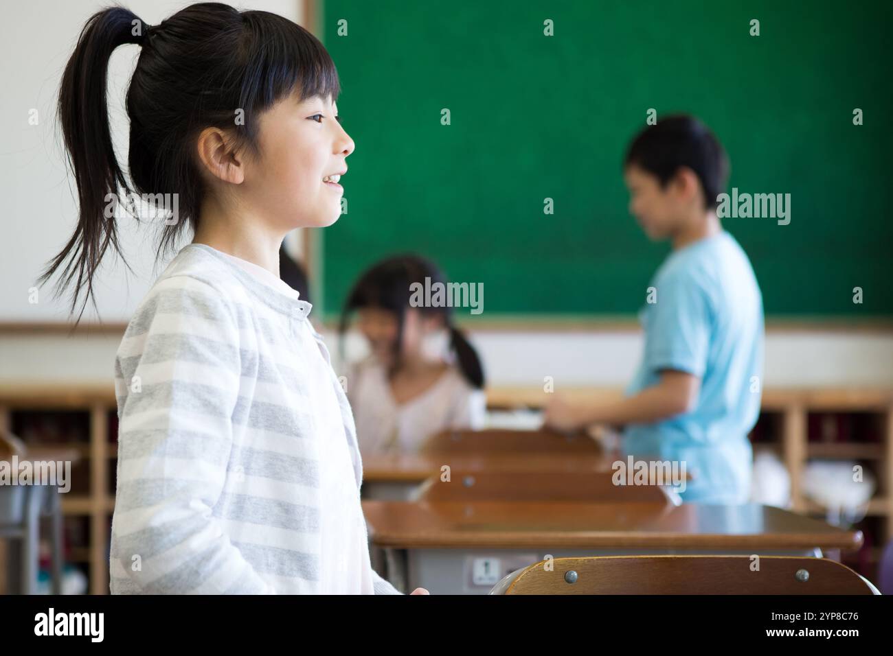 Primary school pupil in classroom Stock Photo - Alamy