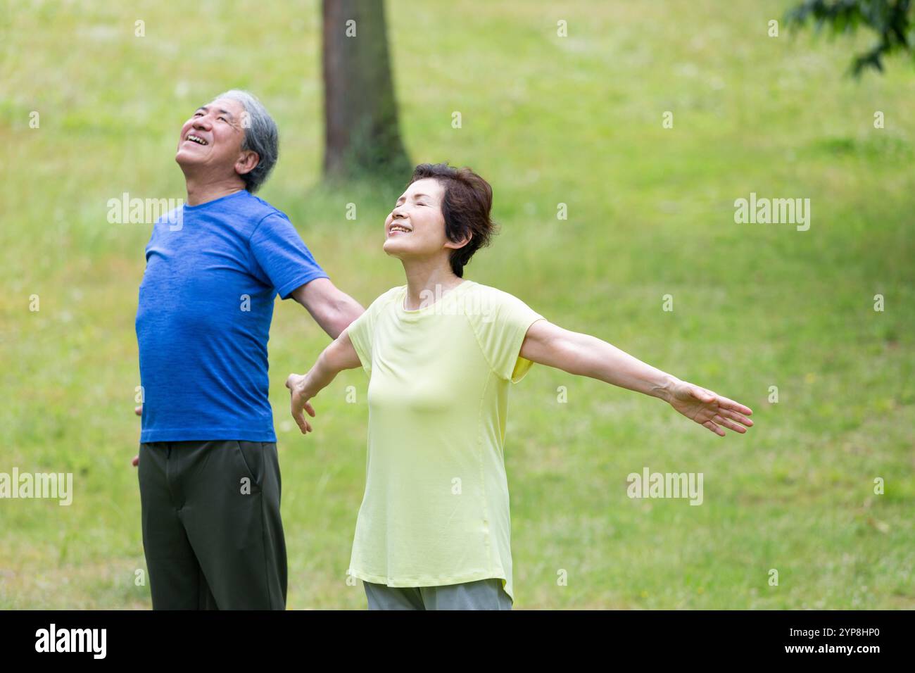 Senior couple taking a deep breath Stock Photo