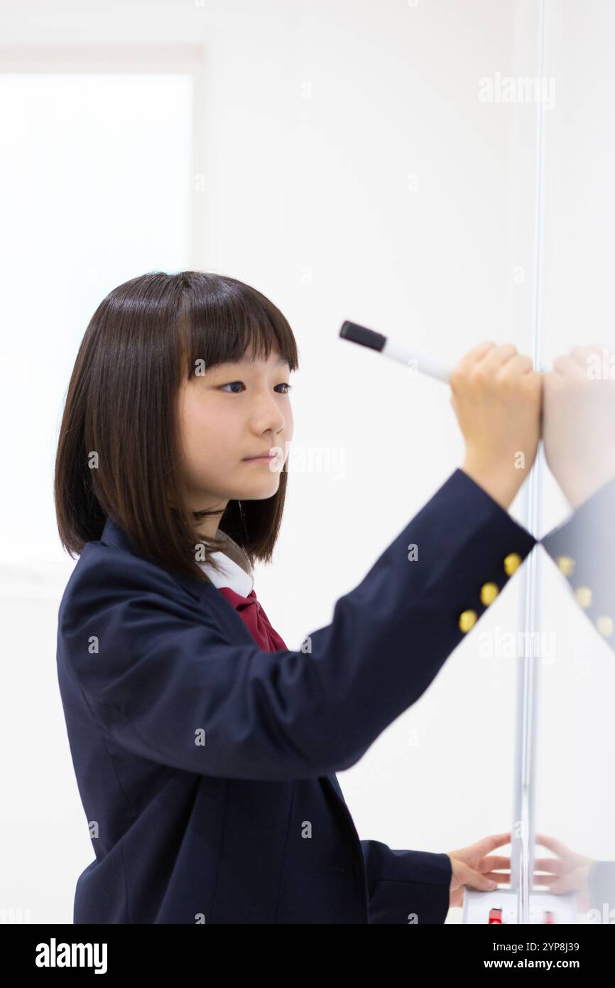 Junior high school students studying at a cram school Stock Photo - Alamy