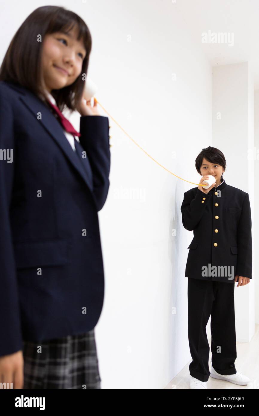 Boys talking school uniform hi-res stock photography and images - Alamy