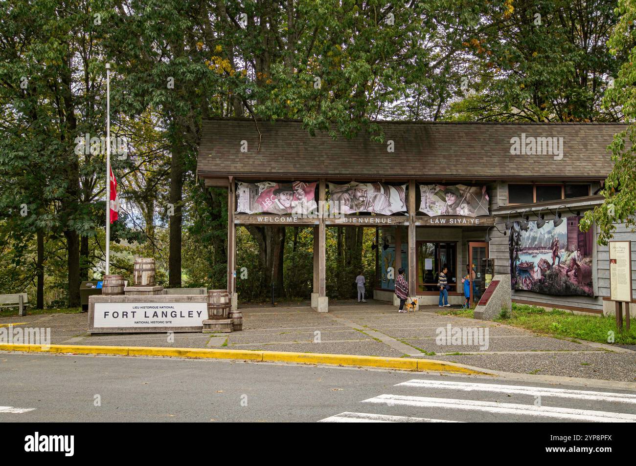 Visitors enter the National Historic Site of Fort Langley (1827), a fur trading post and a center for bartering with aboriginal peoples. Stock Photo