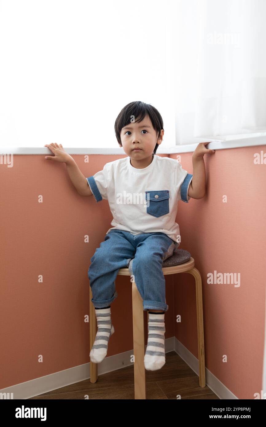 Boy stool studio hi-res stock photography and images - Alamy