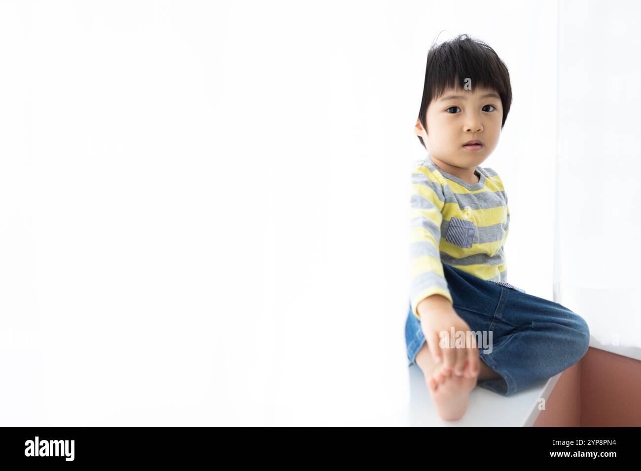 Boy orange t shirt hi-res stock photography and images - Alamy