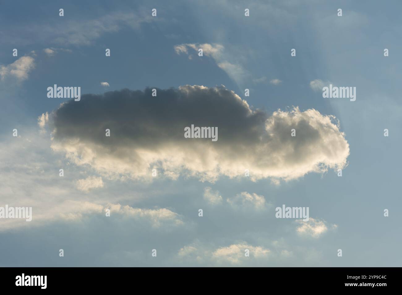 A lost cloud against a blue sky Stock Photo