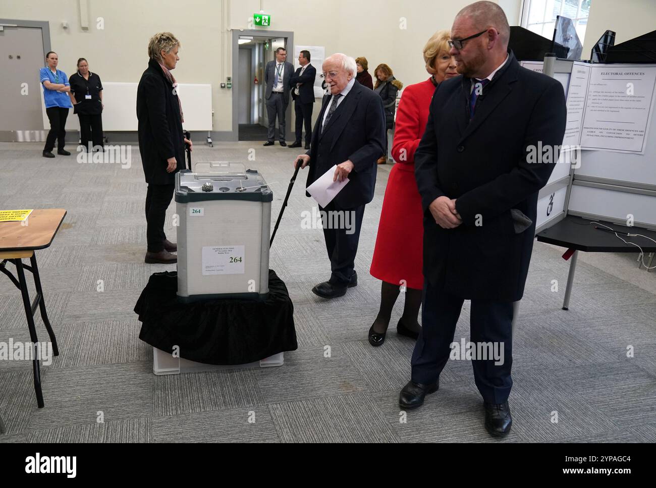 Irish President Michael D Higgins (centre) and his wife Sabina (centre right) cast their votes for the 2024 General Election at St Mary's Hospital, Phoenix Park, Dublin. Picture date: Friday November 29, 2024. Stock Photo