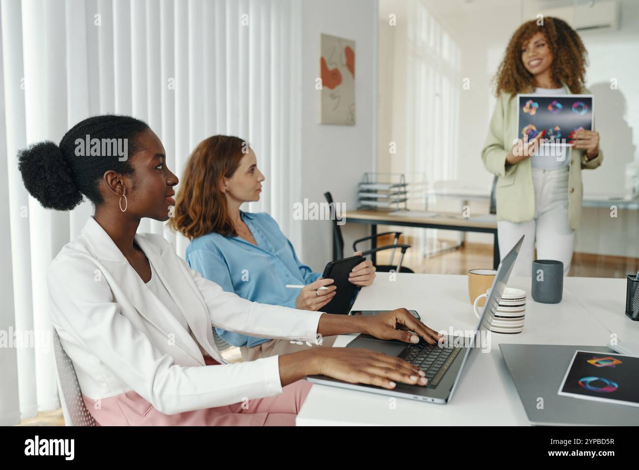 Collaborating in Modern Office Setting During Presentation Stock Photo ...