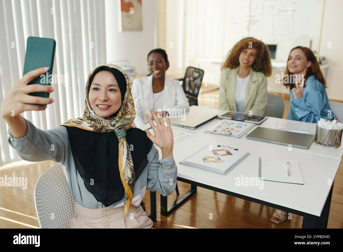 Smiling Diverse Team During Office Meeting Stock Photo - Alamy