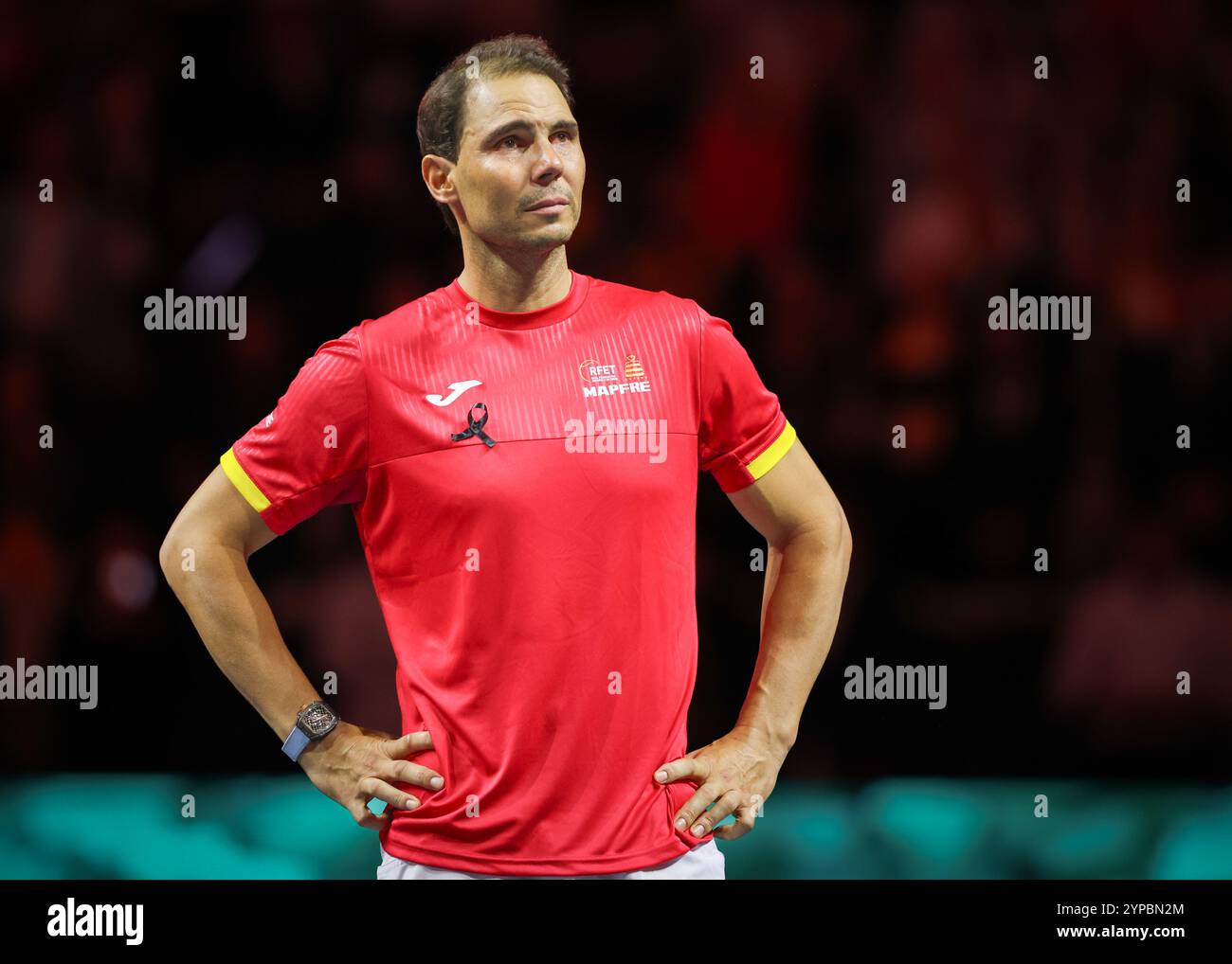 Rafael Nadal (ESP) watching a video of his career during a tribute