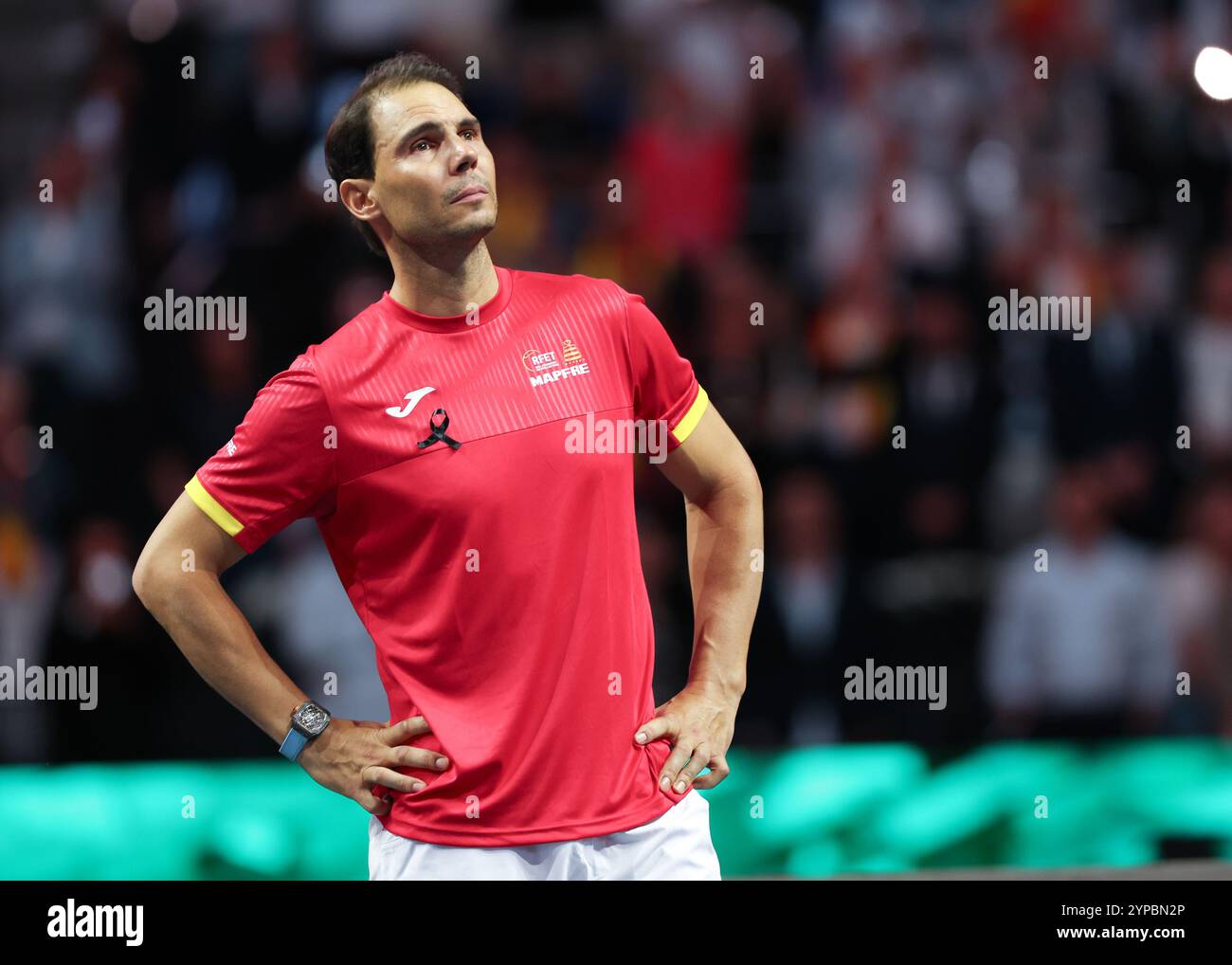 Rafael Nadal (ESP) watching a video of his career during a tribute