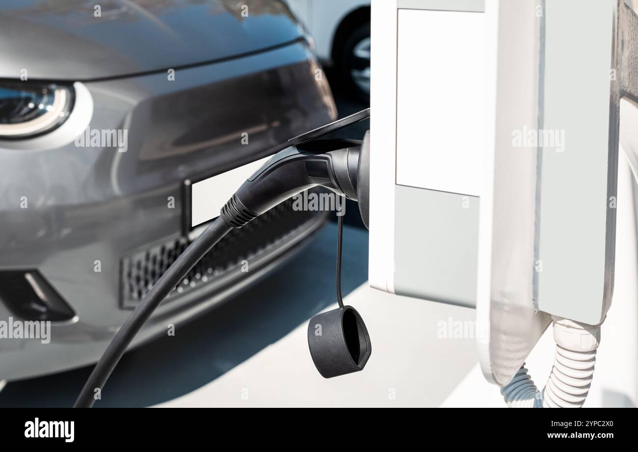 Electric car charging station background. EV charge port. Stock Photo