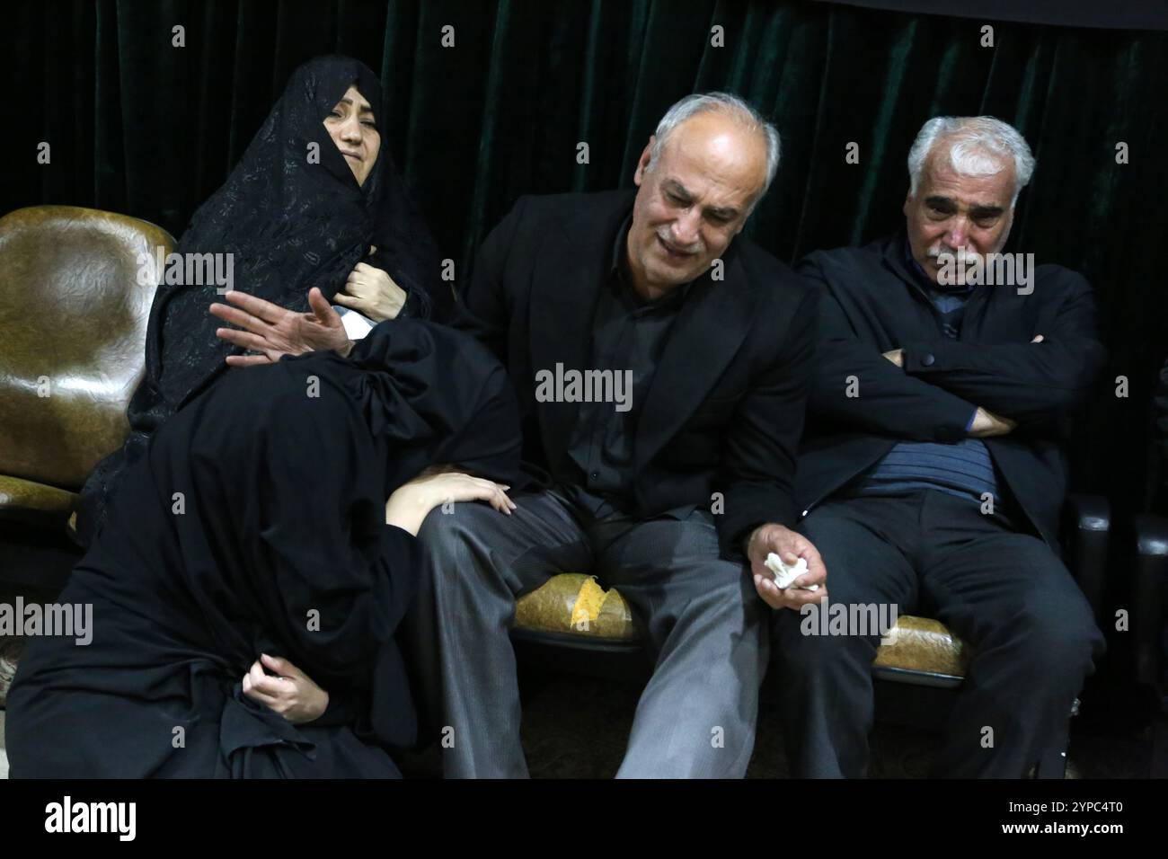 Tehran, Iran. 29th Nov, 2024. Family and relevance mourn during the funeral ceremony of Brigadier General Kiyomarth Porhashmi, a senior officer of the Islamic Revolutionary Guard Corps (IRGC) Quds Force, who was killed in Aleppo, Syria. The IRGC Quds Force is a unit of Iran's Revolutionary Guard that conducts military, intelligence, and support operations abroad to advance Iran's regional influence. (Credit Image: © Rouzbeh Fouladi/ZUMA Press Wire) EDITORIAL USAGE ONLY! Not for Commercial USAGE! Stock Photo